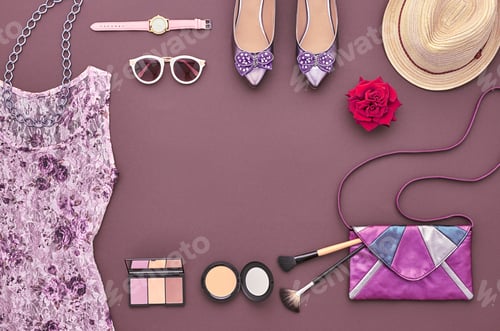 Fashion and Beauty Items Laid Out on Background