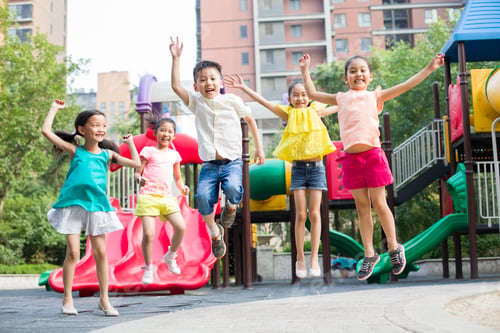 Preview: Happy children playing in park