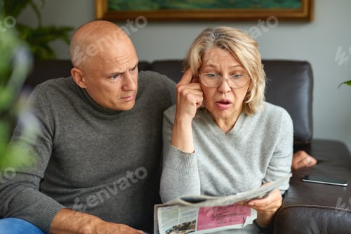 Preview: Grandson With His Grandmother Reading Newspaper.News, Press, Media, Holidays And People Concept .