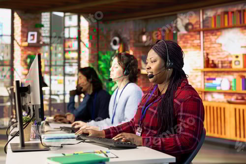 Preview: Multiracial customer service colleagues assisting clients with issues