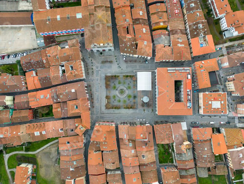 Preview: Aerial top view of orange roofs of houses in a village in Basque Country
