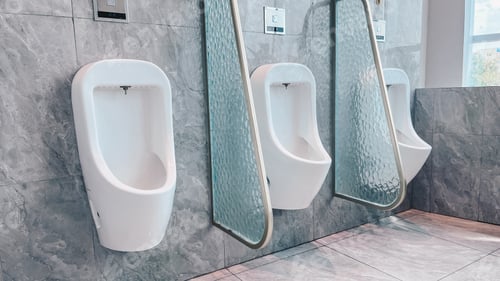 Preview: Men's toilet. Row of outdoor urinals men public toilet, Closeup white urinals in men's bathroom.