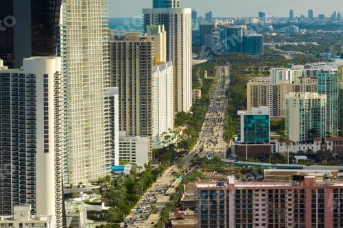 Preview: Sunny Isles Beach city with heavy urban traffic and expensive highrise hotels
