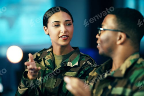 Preview: Man and Woman in Camouflage Discuss Strategy