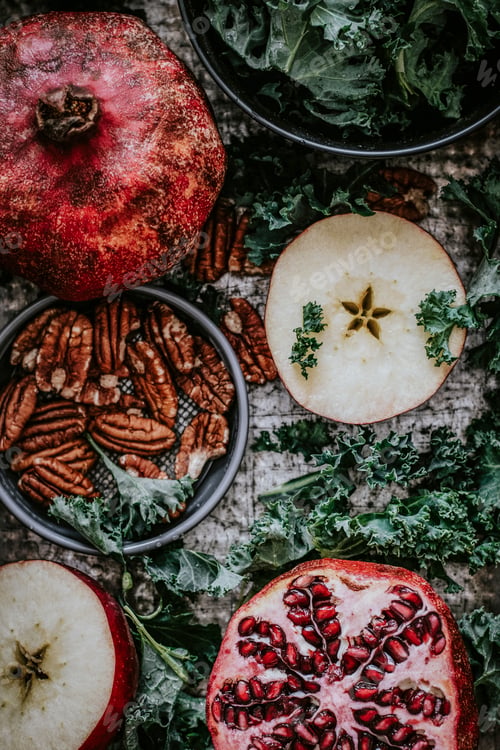 Preview: Fresh pomegranate with apples and pecans food photography