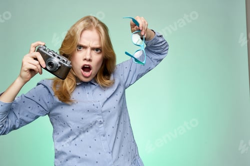 Preview: Emotional woman in shirt photographic camera glasses studio photographer