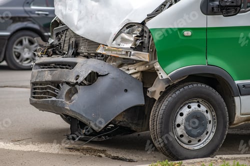 Preview: Heavily damaged car after car crash accident on a city street.