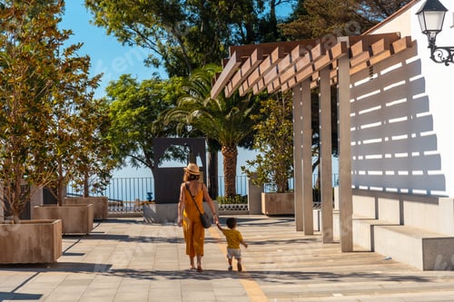 Preview: A young mother with her son in the municipality of Mijas in Malaga. Andalusia