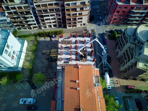 Preview: Aerial view of the construction of apartments in the area with streets and cars