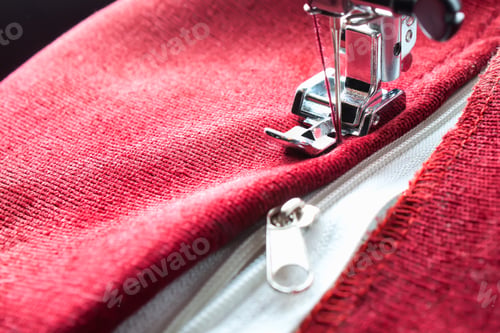 Preview: Modern sewing machine presser foot and zipper. Sewing process