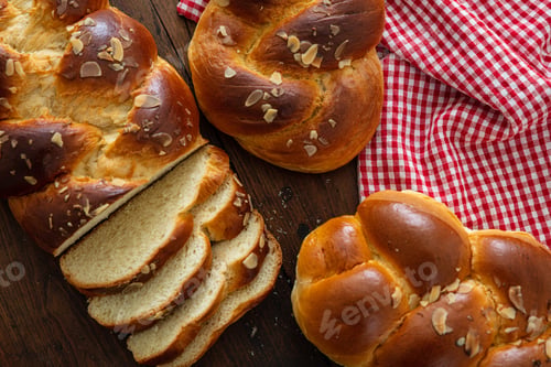 Preview: Easter greek tsoureki braid, sweet bread brioche on wood