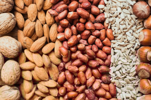 Preview: Delicious Assortment of Mixed Nuts on a Wooden Surface