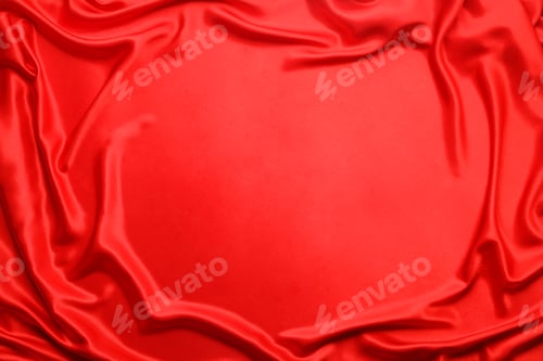 Preview: Romantic decor. Crumpled red silk fabric as background, top view. Space for text