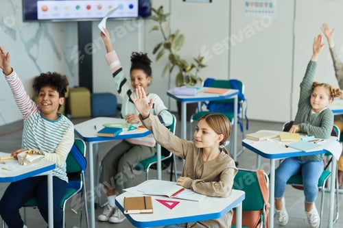 Preview: Excited Kids Raising Hands in Class