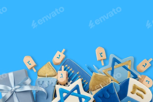 Preview: Decorative hanukkah cookies and dreidels on blue background