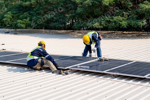 Preview: workers installing solar panels, for efficient energy on rooftop