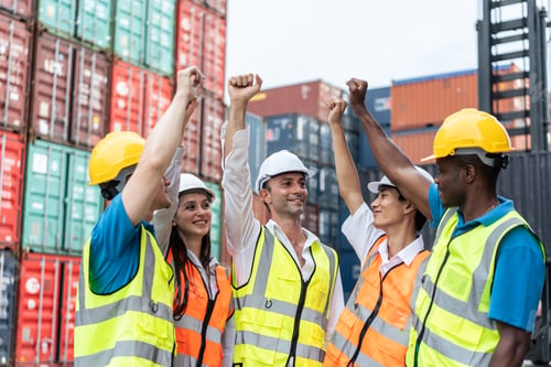Preview: Group of young male and female worker working in container terminal.