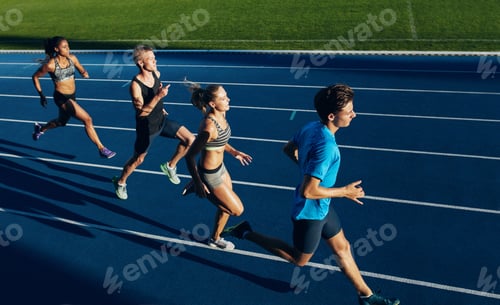 Preview: Multiracial athletes practicing running on racetrack