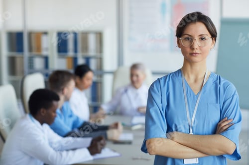 Preview: Young Nurse Posing in Clinic