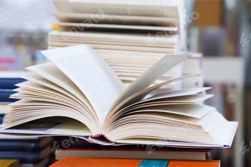 Preview: open book on table. back to school