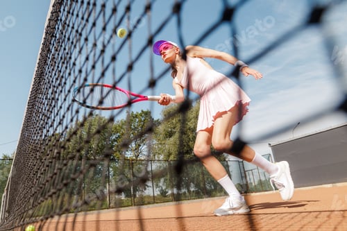 Preview: Female Tennis Player Reaching Volley Shot Near Net Outdoor Court