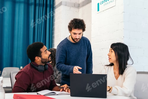 Preview: Group of people working with laptop in a coworking