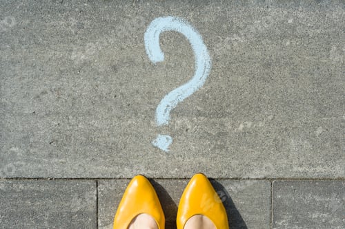 Preview: Woman feet with question mark in front of her legs painted on the asphalt.