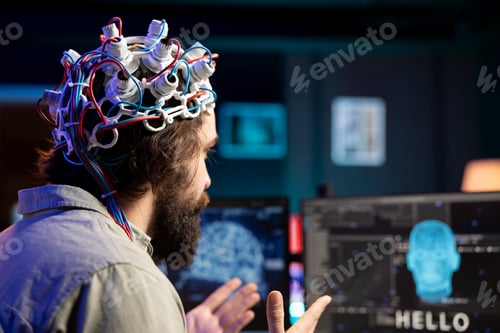 Preview: Developer using EEG headset device translating thoughts into PC commands