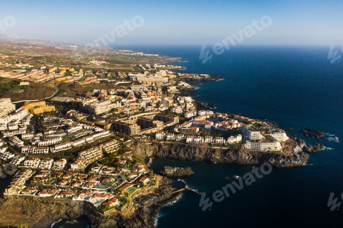 Preview: Top view of the houses located on the rock of Los Gigantes at sunset, Tenerife, Canary Islands