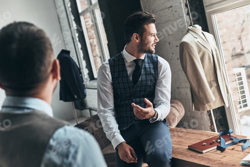 Preview: Tailor and Client Discussing Bespoke Suit Alterations