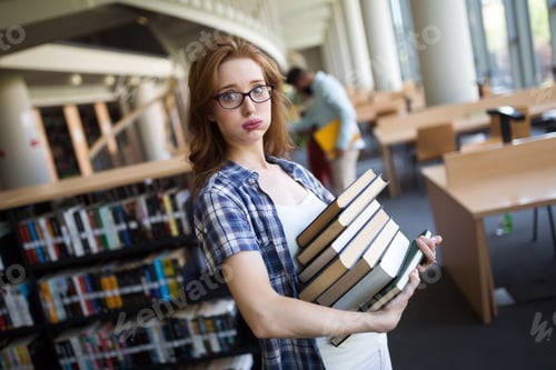 Preview: Frustrated teen student girl with books