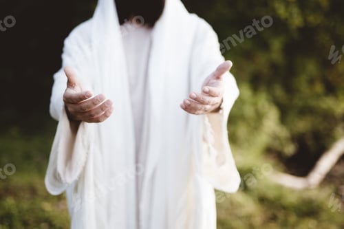 Preview: Closeup of Jesus Christ reaching out with a blurred background