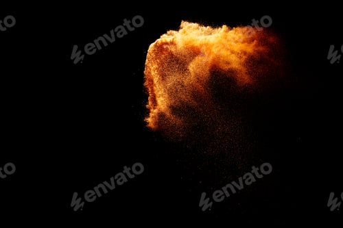 Preview: Sand flying explosion isolated on black background ,throwing freeze stop motion object design.