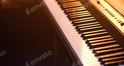 Preview: piano keys close-up, on a beautiful colored background