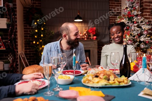 Preview: Couple at family christmas holiday celebration