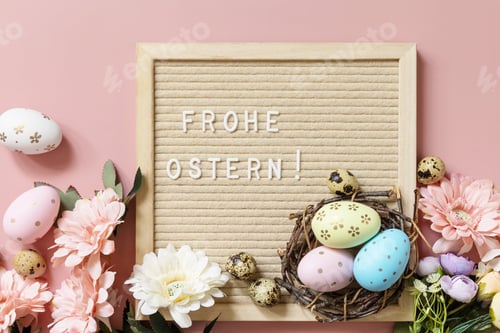 Preview: Letter board, Frohe Ostern - Happy Easter in german greeting, Easter eggs and spring flowers.