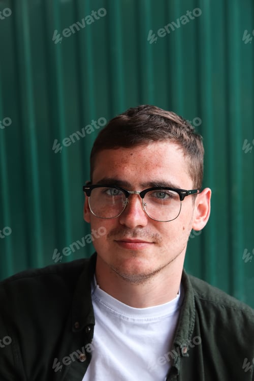 Preview: Man wearing eyeglasses. Happy smiling smart man. Portrait of handsome smiling stylish hipster lamber
