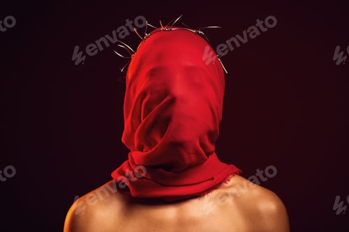 Preview: Red fabric, creative aesthetic and religion in a studio with a face covering model for luxury cloth