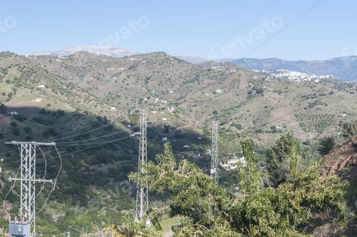 Preview: Beautiful mountain landscape with pylons in La Axarquia Malaga, Spain