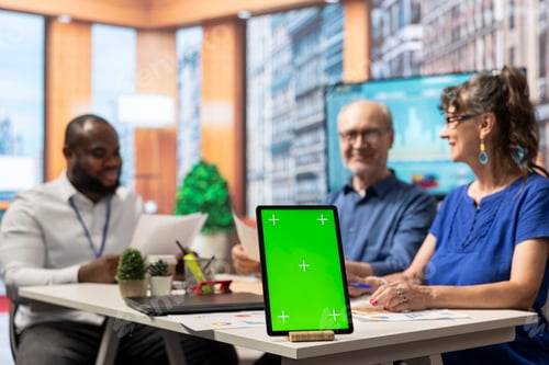 Preview: Senior man and woman meeting with advisor in modern office