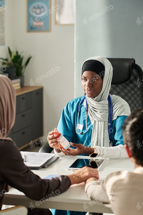 Preview: Muslim Medical Professional Explaining Prescription to Patients