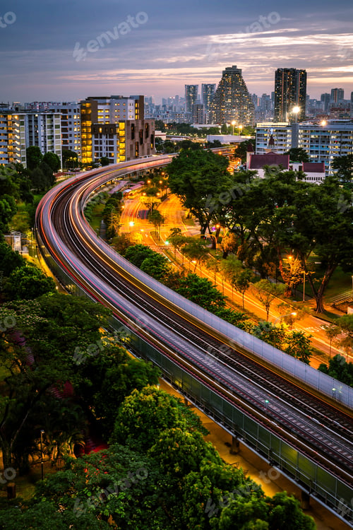 Preview: View of the light trails on the north-south line train tracks and the skyscrapers in Bishan.