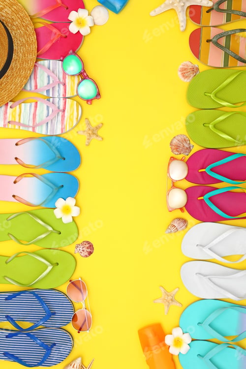 Preview: Flat lay composition with summer beach accessories on yellow background. Space for text