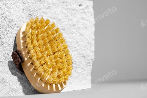 Preview: Skincare massage brush on gray concrete block