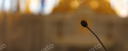 Preview: Microphone in concert hall or conference room soft and blur style for background.