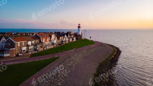 Preview: Lighthhouse of Urk Netherlands during sunset in the Netherlands