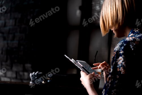Preview: Woman surfing on her smartphone