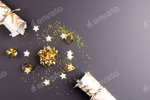 Preview: Image of christmas cracker with christmas decoration and copy space on grey background