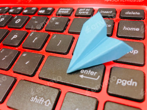 Preview: Paper plane origami on keyboard