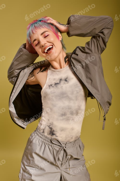 Preview: Colorful hair and joyful expression in vibrant studio setting